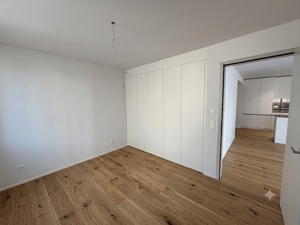 Helle 2.5-Zimmer-Neubauwohnung mit Gartenanteil 3