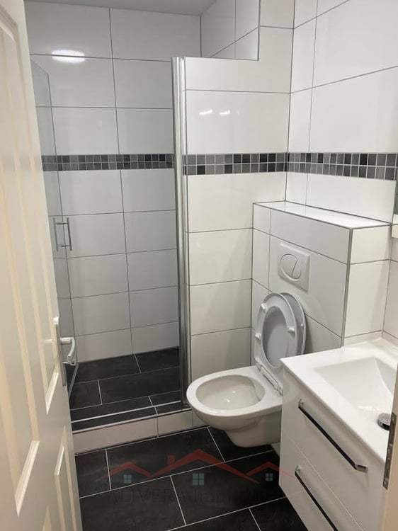 Attraktive Renditeimmobilie: Modernisiertes Mehrfamilienhaus mit 4 Woh 11