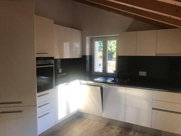 Attico con stupenda vista lago in casa di soli 3 appartamenti 15