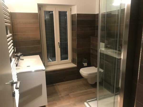 Attico con stupenda vista lago in casa di soli 3 appartamenti 10