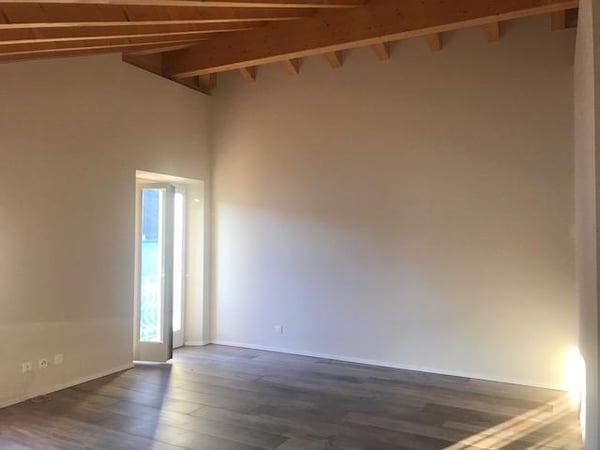 Attico con stupenda vista lago in casa di soli 3 appartamenti 13