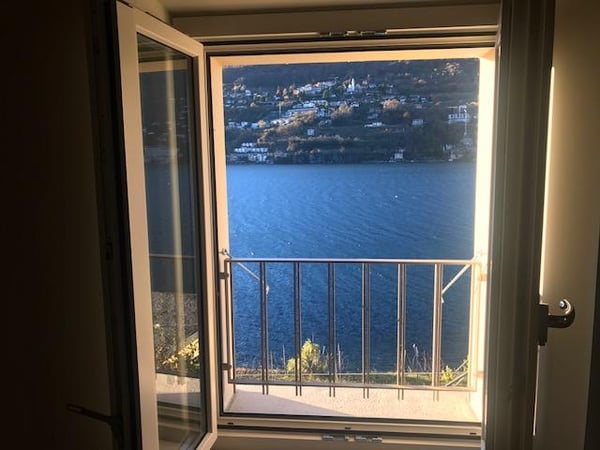 Attico con stupenda vista lago in casa di soli 3 appartamenti 5