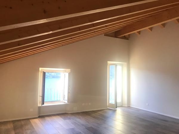Attico con stupenda vista lago in casa di soli 3 appartamenti 14