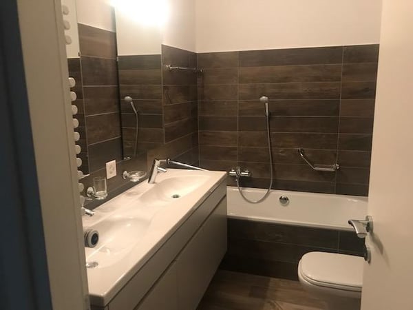 Attico con stupenda vista lago in casa di soli 3 appartamenti 7