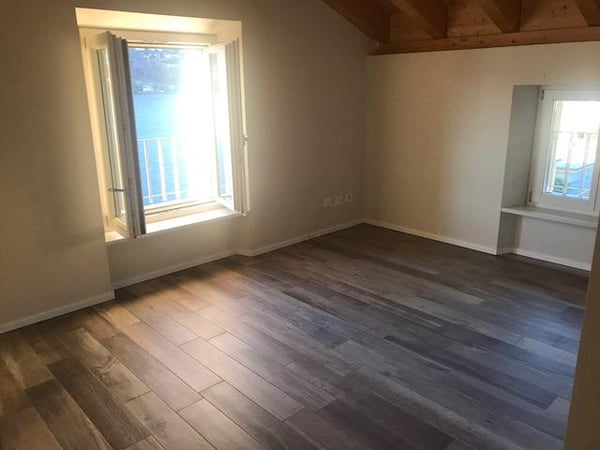 Attico con stupenda vista lago in casa di soli 3 appartamenti 6