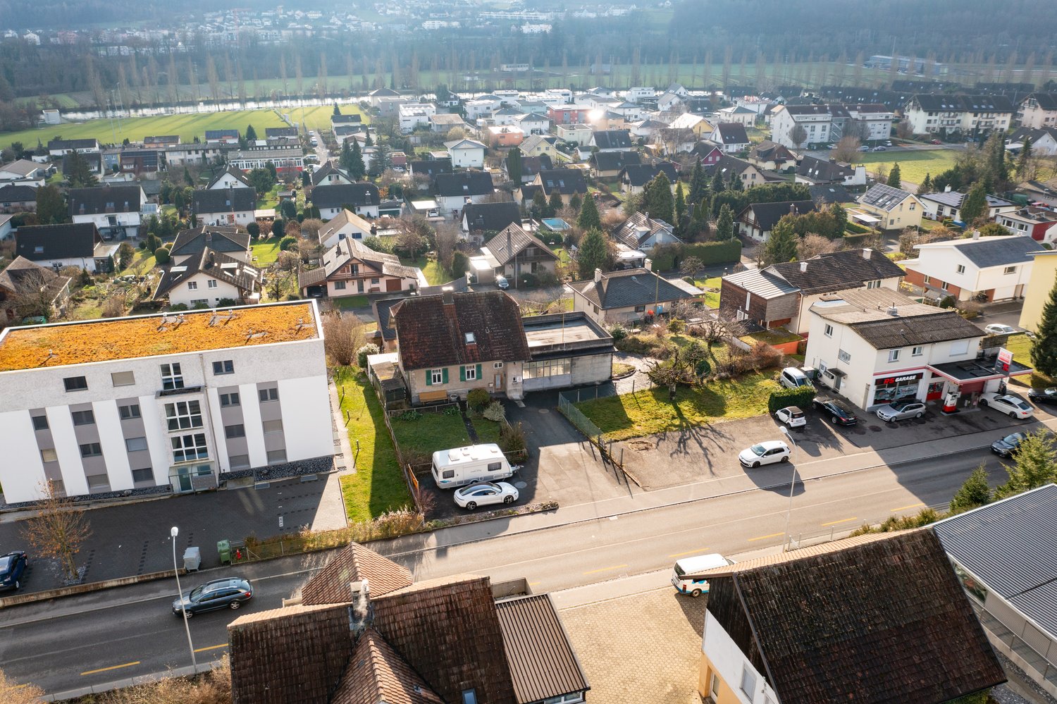 residential area, several houses, driveways, parking, aerial view
