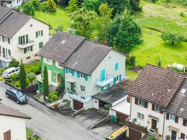 Charmates Reiheneinfamilienhaus mit Garten, Werkstatt, Garage und viel Potenzial 3