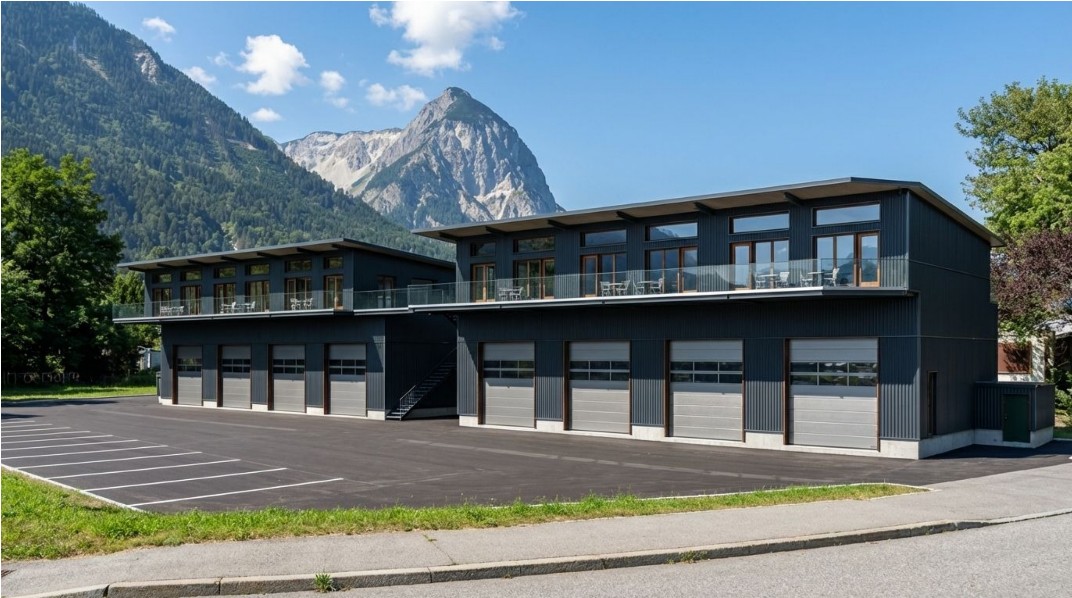 modern building with 3 levels, 4 garages on the ground floor, balcony on the second floor, parking area in front