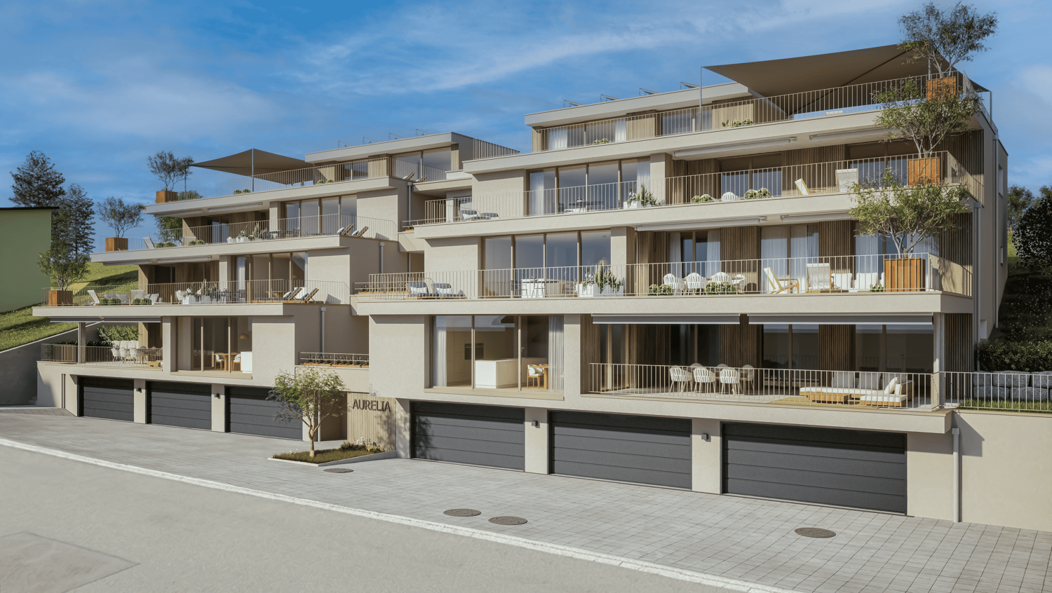 A multi-storey apartment building with glass windows, balconies, garages, and a tree in front.