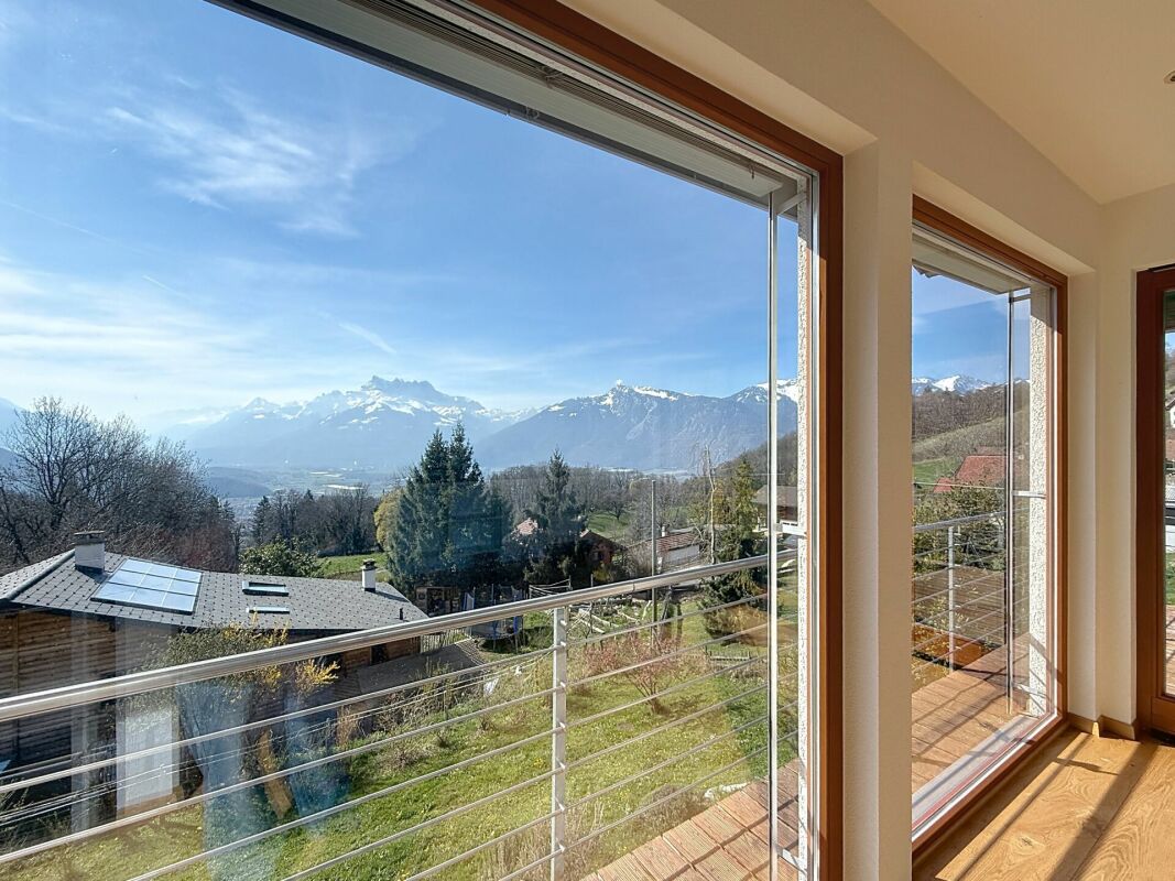 Magnifique villa d'architecte avec spectaculaire vue panoramique sur la plaine et les Dents-du-Midi