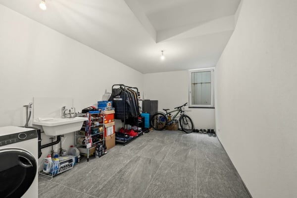 Modernes Wohnen auf zwei Ebenen - Stilvolle Maisonettewohnung in Allschwil 12