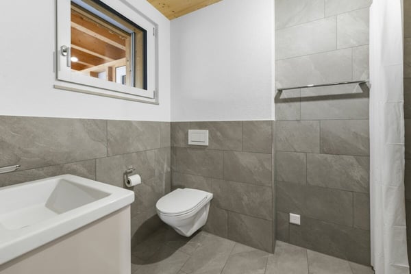 Modernes 1.5-Zimmer-Doppeleinfamilienhaus mit Gartenidylle und hochwertiger Ausstattung 18