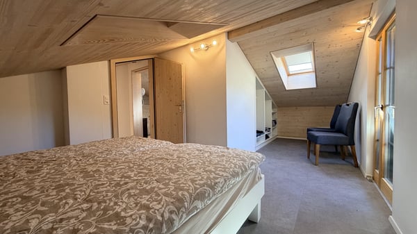 Chalethaus mit Einliegerwohnung und Wellnessoase 8