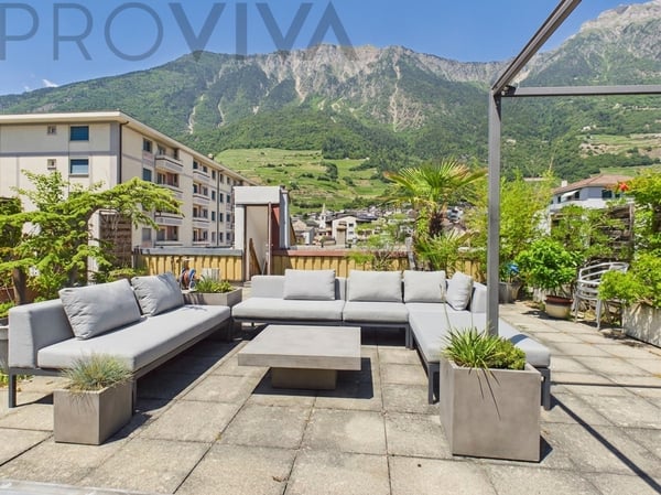 Einzigartige Wohnung mit eigener Terrasse (92 m²) im Herzen von Fully 1