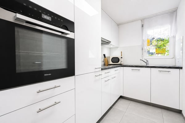 Exklusive Gartenwohnung mit Seesicht, Seezugang & hoher Rendite 8