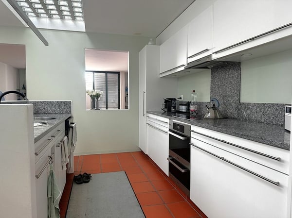 Zeitlose Architektur trifft auf überraschende Wohnqualität 10