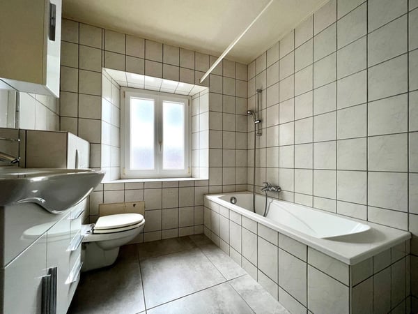 Immeuble d'habitation avec 5 appartements 10