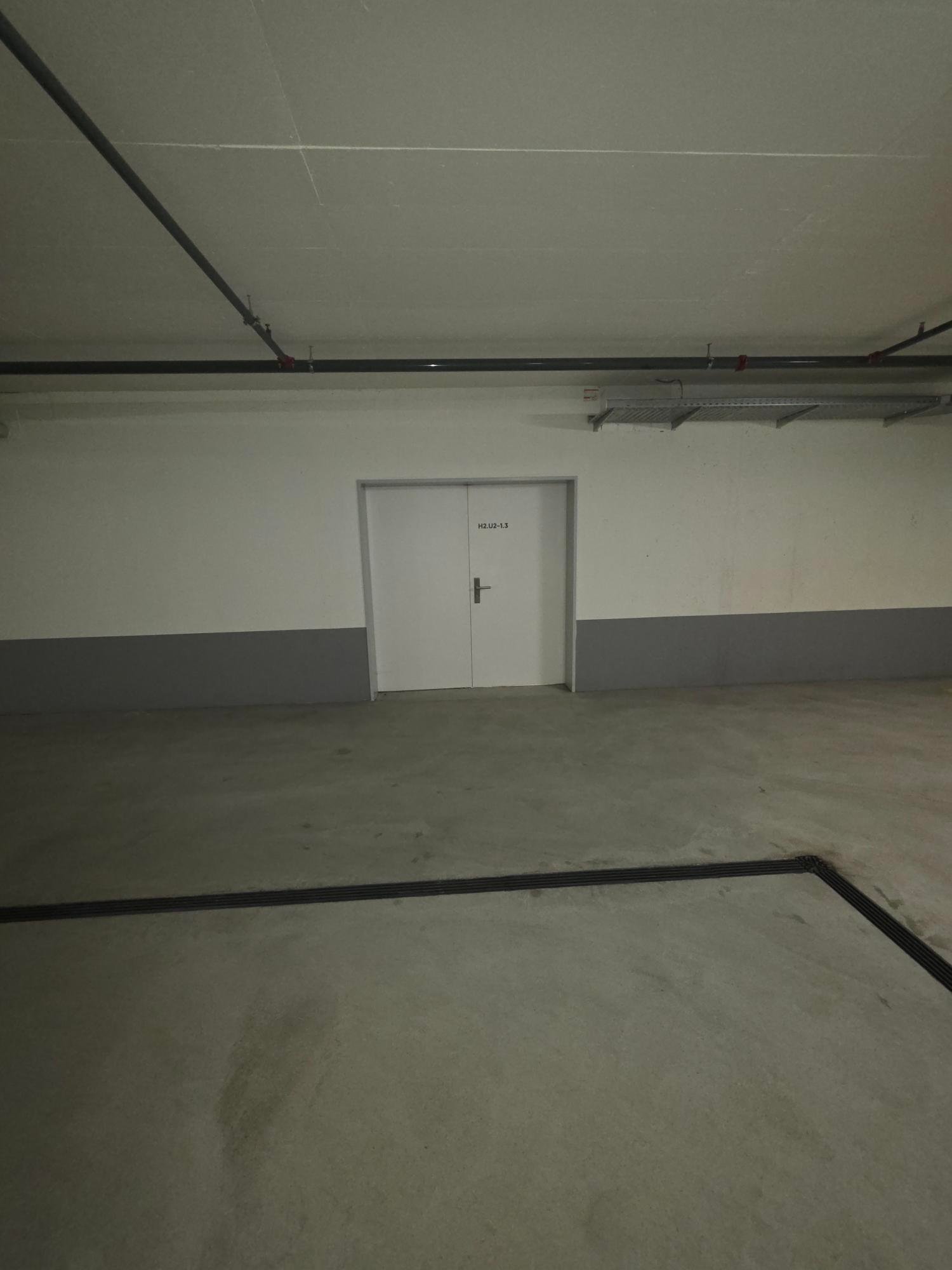 white door, black parking lines