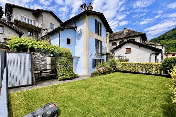 Casa con giardino e 4 posteggi 3