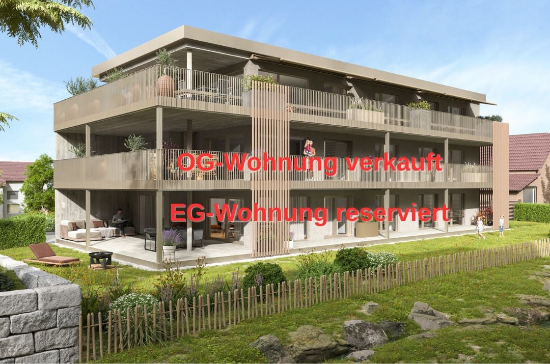 3-storey apartment building with a ground-level terrace and balconies on the first two floors.