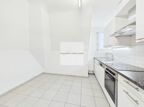 Heimelige 3.5-Zi Dachwohnung an ruhiger Lage 2