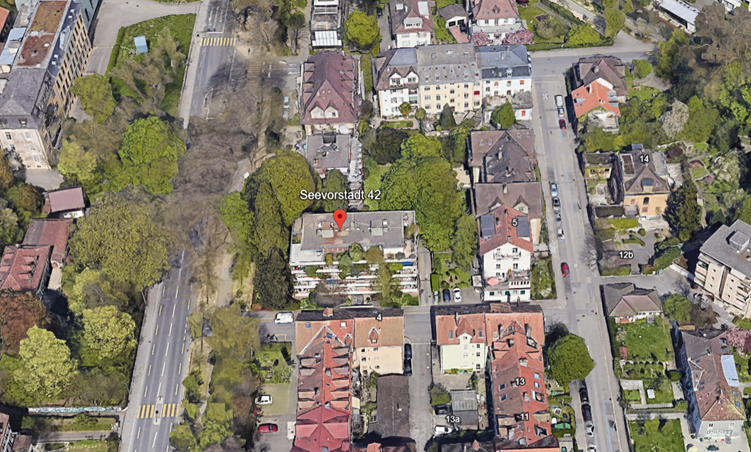 Aerial view of a residential area with multiple buildings, Seevorstadt 42 marked with a red pin.