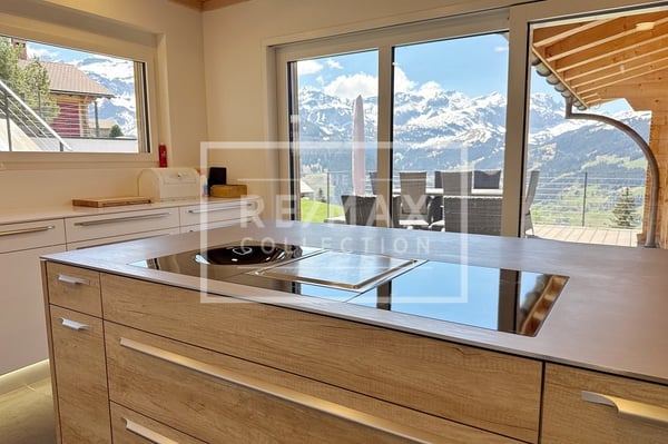 Exklusives Wohnen mit einzigartigem Panorama - eine magische Perle in stilvoller Architektur 12