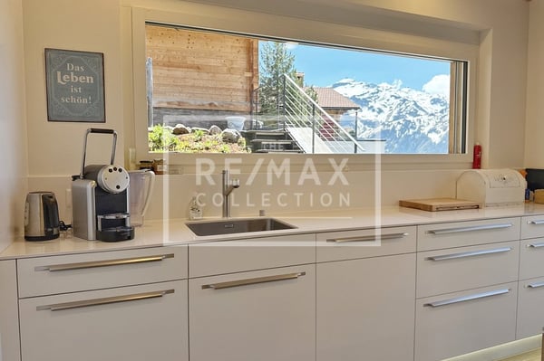 Exklusives Wohnen mit einzigartigem Panorama - eine magische Perle in stilvoller Architektur 13