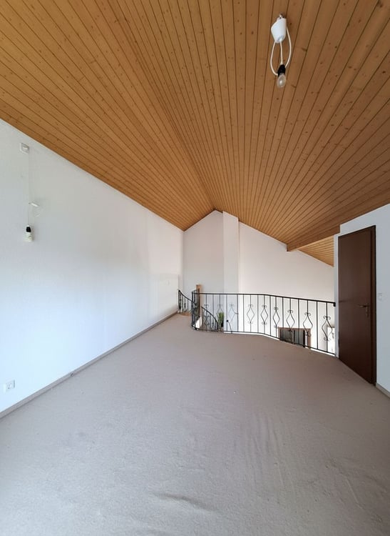 Charmante Maisonettewohnung mit Cheminée und Ausbaupotenzial 4