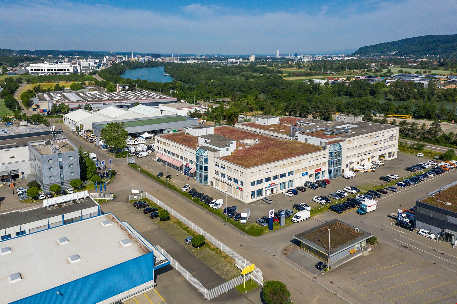 Multi-building industrial estate with parking lot and road network