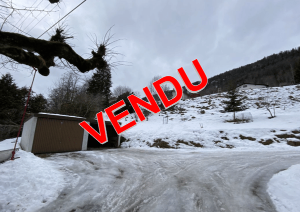Sonvilier, terrain à vendre avec 2 garages