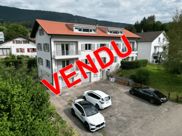Bévilard, immeuble refait à neuf de 6 appartements et 2 garages