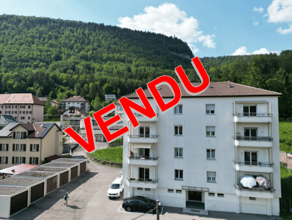 St-Imier, immeuble 8 app, 6 garages - 5.7% rendement - entièrement loué