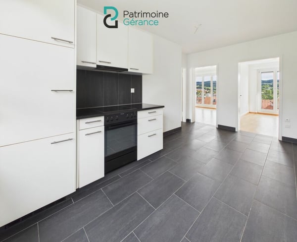 Spacieux ! Appartement de 3.0 pièces avec vue sur la ville 1
