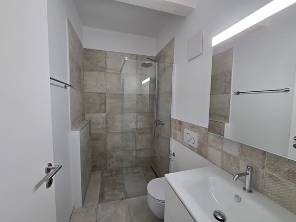 Charmants appartements neufs de 3,5 pièces au centre du village 12
