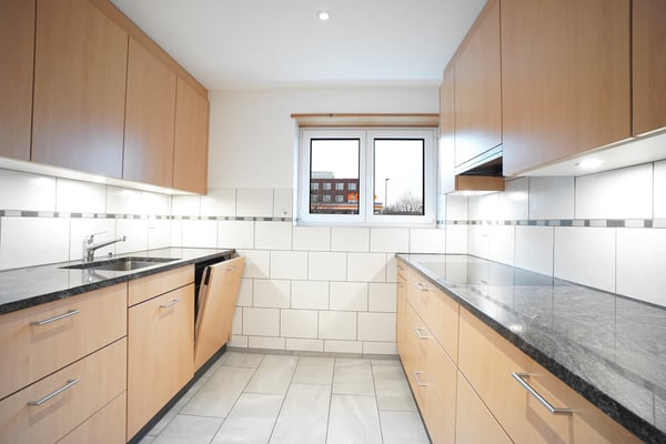 Mehrfamilienhaus mit 4 Wohnungen inkl. 7 Garagen und 6 Aussenparkplätzen 18