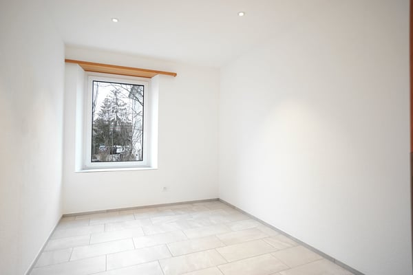 Mehrfamilienhaus mit 4 Wohnungen inkl. 7 Garagen und 6 Aussenparkplätzen 13