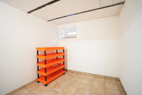 Mehrfamilienhaus mit 4 Wohnungen inkl. 7 Garagen und 6 Aussenparkplätzen 26