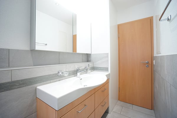 Mehrfamilienhaus mit 4 Wohnungen inkl. 7 Garagen und 6 Aussenparkplätzen 16