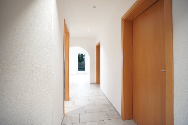 Mehrfamilienhaus mit 4 Wohnungen inkl. 7 Garagen und 6 Aussenparkplätzen 14