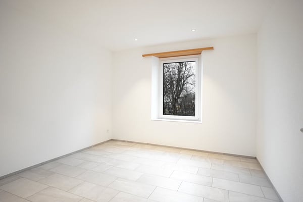 Mehrfamilienhaus mit 4 Wohnungen inkl. 7 Garagen und 6 Aussenparkplätzen 12