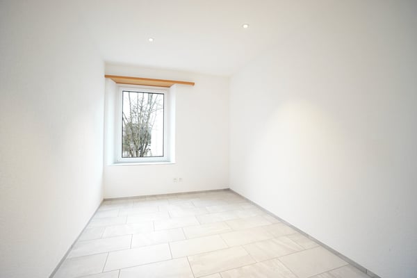 Mehrfamilienhaus mit 4 Wohnungen inkl. 7 Garagen und 6 Aussenparkplätzen 11