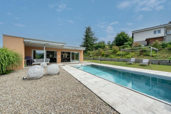 Modernes Einfamilienhaus mit 100m2 Wohnraum, gepflegte Gartenanlage mit Pool 8