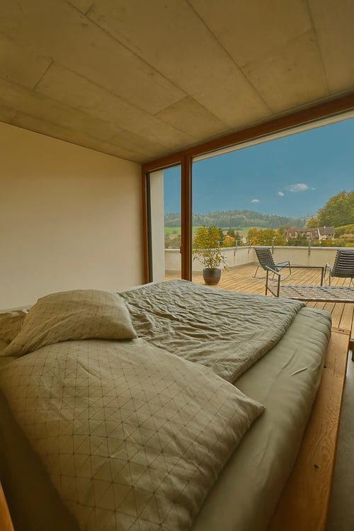 Architektonisches Meisterwerk in Sichtbeton – 1.5-Zimmer-Maisonette mit zwei Terrassen 21