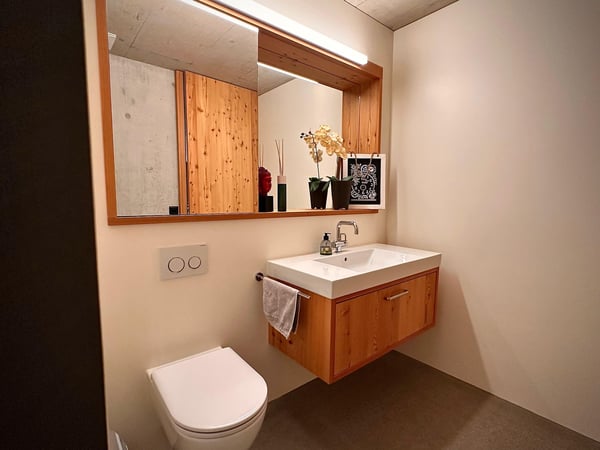 Architektonisches Meisterwerk in Sichtbeton – 1.5-Zimmer-Maisonette mit zwei Terrassen 25