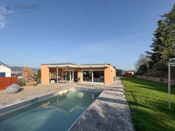 Modern & Aussergewöhnlich mit 290m2 Nutzfläche, gepflegte Gartenanlage mit Chromstahlpool 1