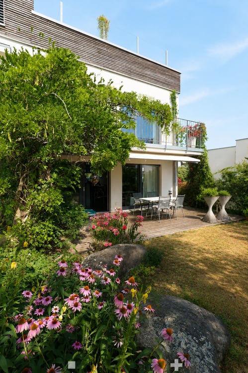 Moderne Architektur trifft auf familienfreundliches Wohnen 3