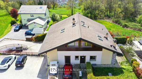 Immeuble loué : 4 appartements, 1 atelier, 5 box et 8 places 2