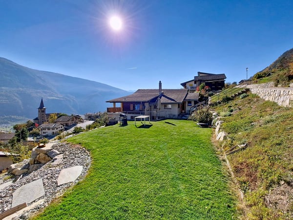 Flanthey – Charmante villa 1.5 pièces avec terrasse, pelouse et garage double 1