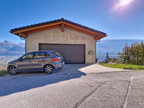 Flanthey – Charmante villa 1.5 pièces avec terrasse, pelouse et garage double 34